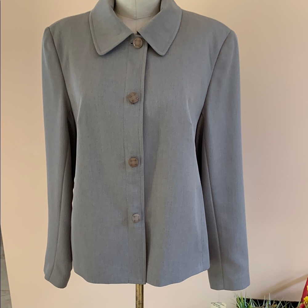 Harlan size 12 classic jacket. Fully lined with two pockets At bottom front.